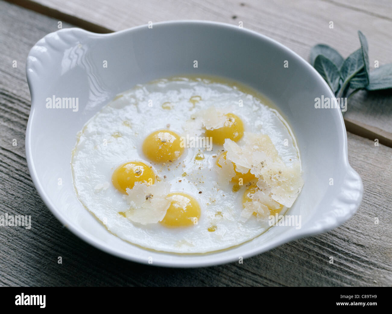 Fried quail's eggs with sageflavored butter Stock Photo Alamy