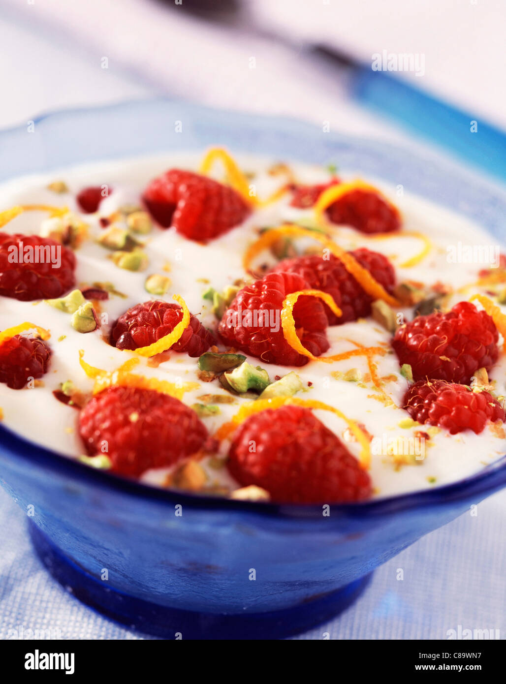 Yoghurt with raspberries Stock Photo