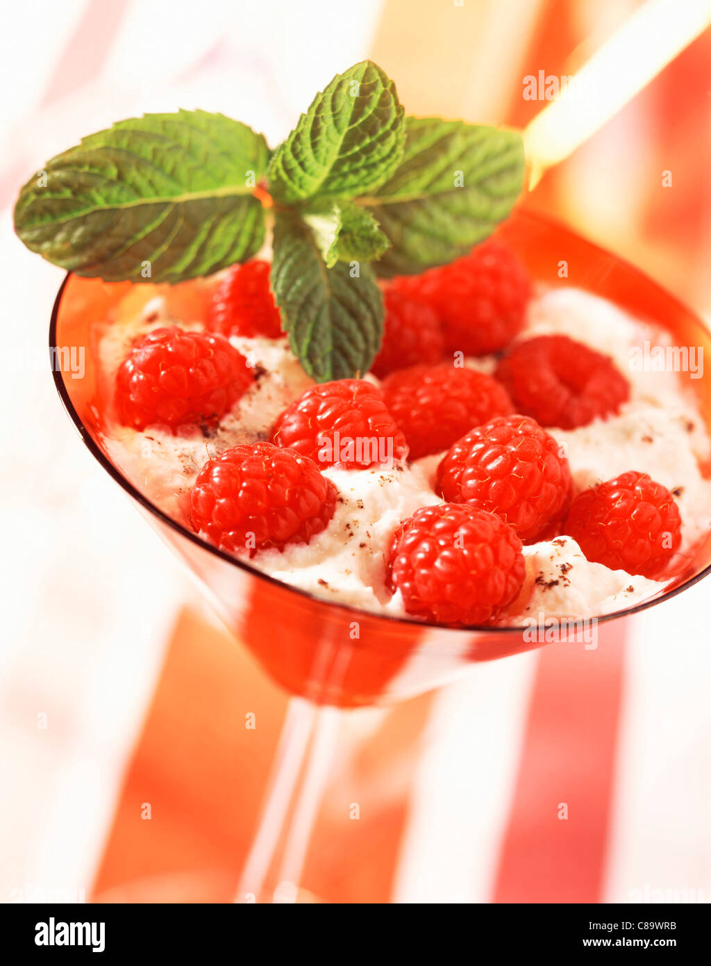 Raspberry and whisked egg white dessert Stock Photo Alamy