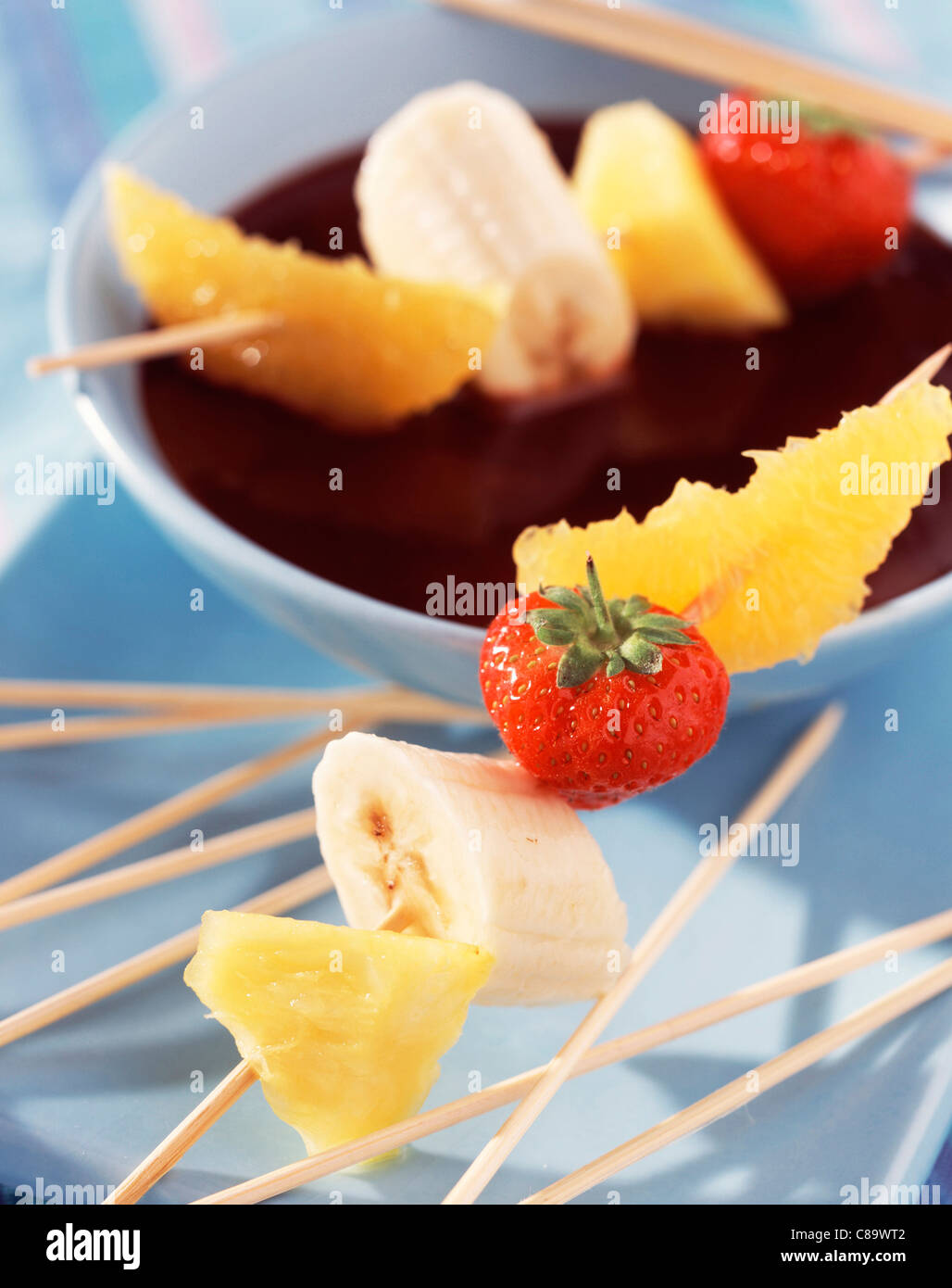 Chocolate fondue with fresh fruit Stock Photo