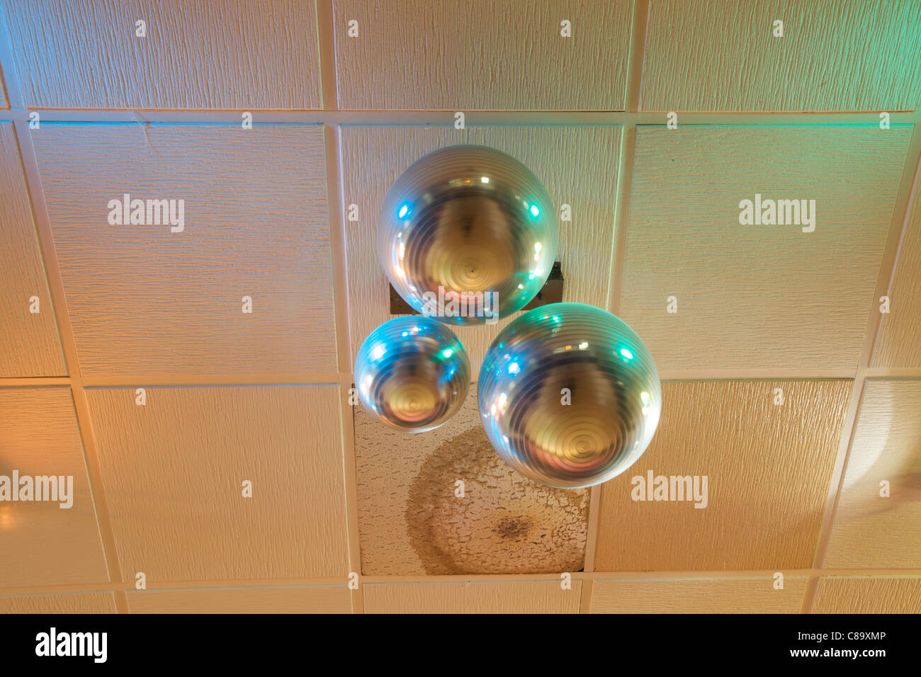 Disco Balls in a working mens club in the north east of England. Stock Photo