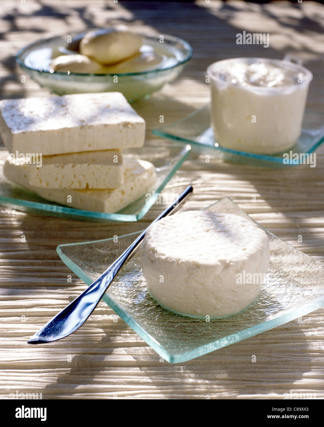 fresh goat's cheese, tub of faisselle, slabs of feta and balls of