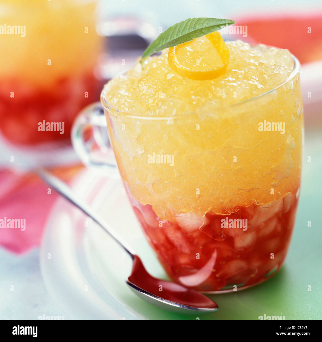 Mixed strawberries and citrus fruit jelly Stock Photo Alamy