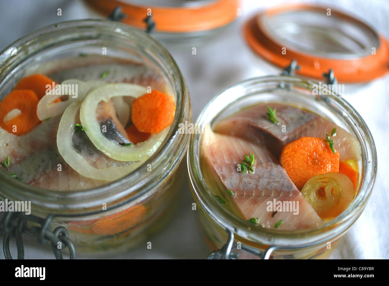Jars of marinated herrings Stock Photo Alamy