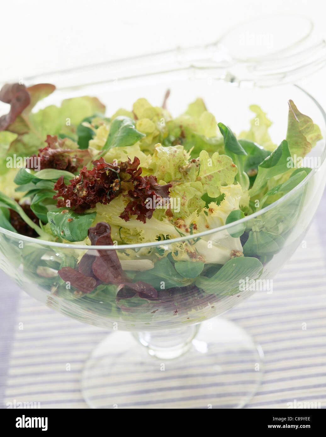 Mixed lettuce with French dressing Stock Photo Alamy