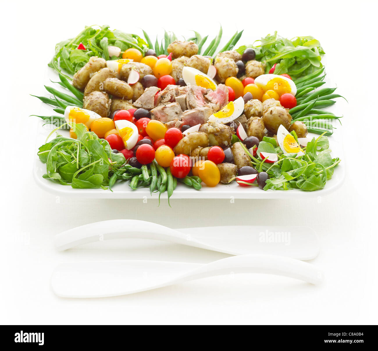 Tuna Niscoise Salad in a white serving bowl Stock Photo