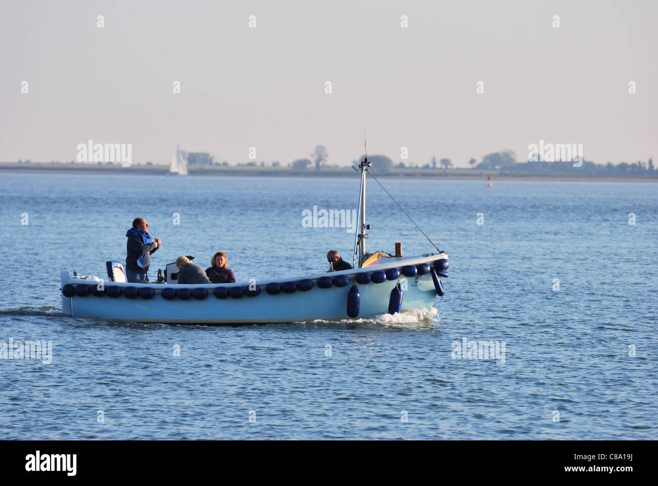fishing boat in estuary Stock Photo Alamy