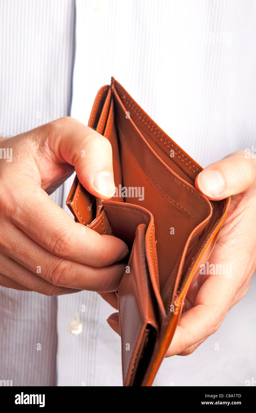 man showing an empty wallet Stock Photo