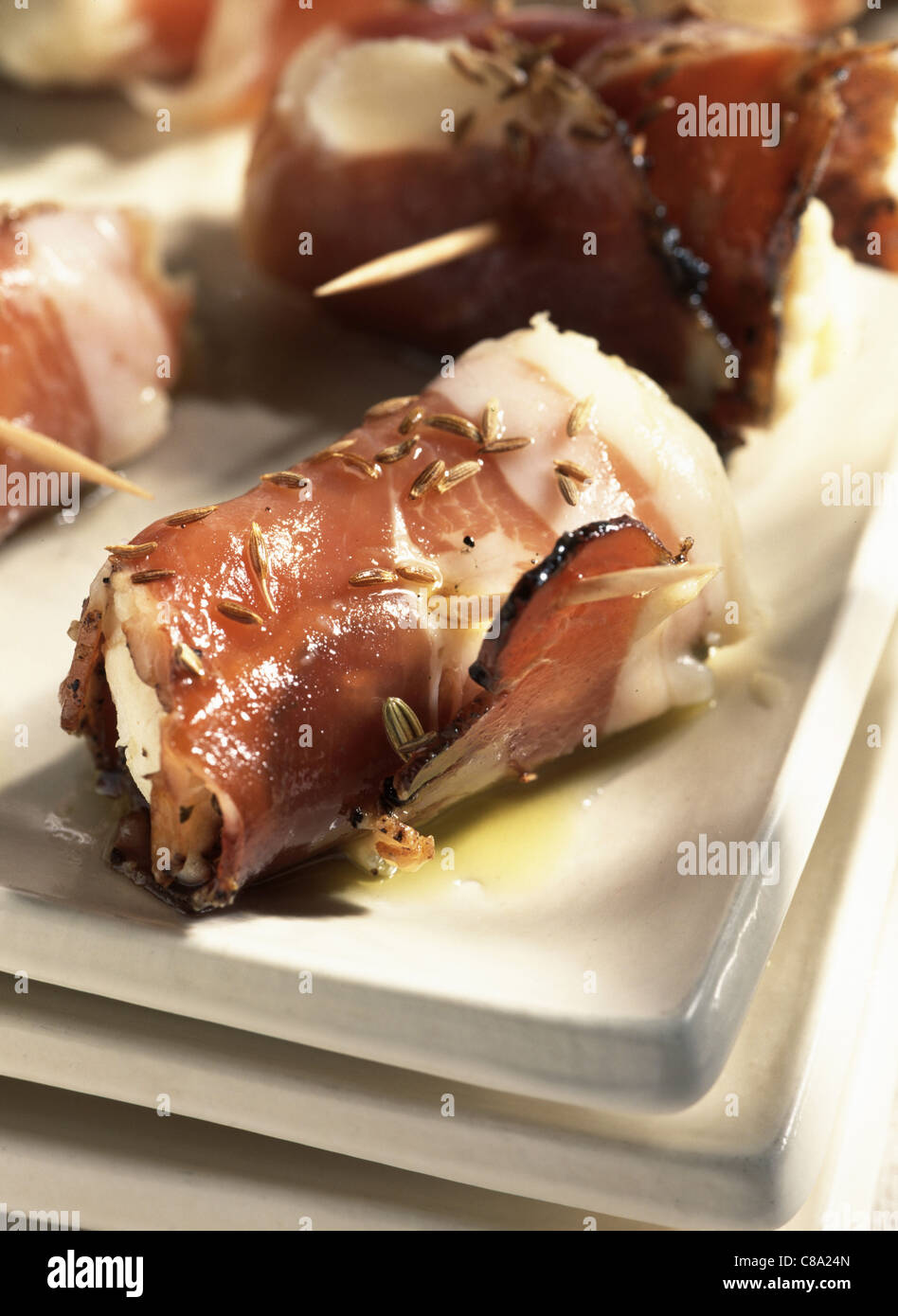 Mozzarella wrapped in smoked ham Stock Photo Alamy