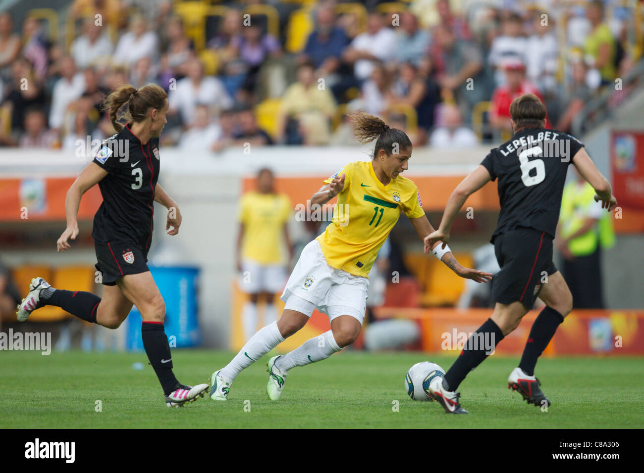 Cristiane of Brazil (11) attacks against the United States during a 2011 FIFA Women's World Cup quarterfinal match. Stock Photo
