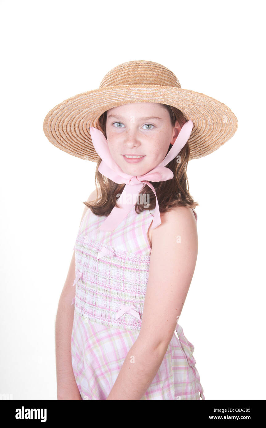 Girl in bonnet with bow Stock Photo
