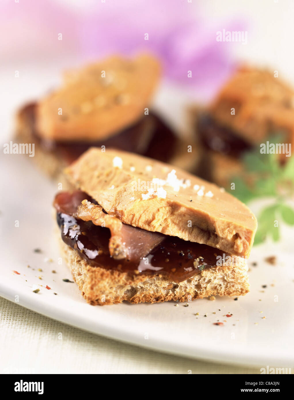 Foie gras, bacon and fig jam in toast Stock Photo Alamy