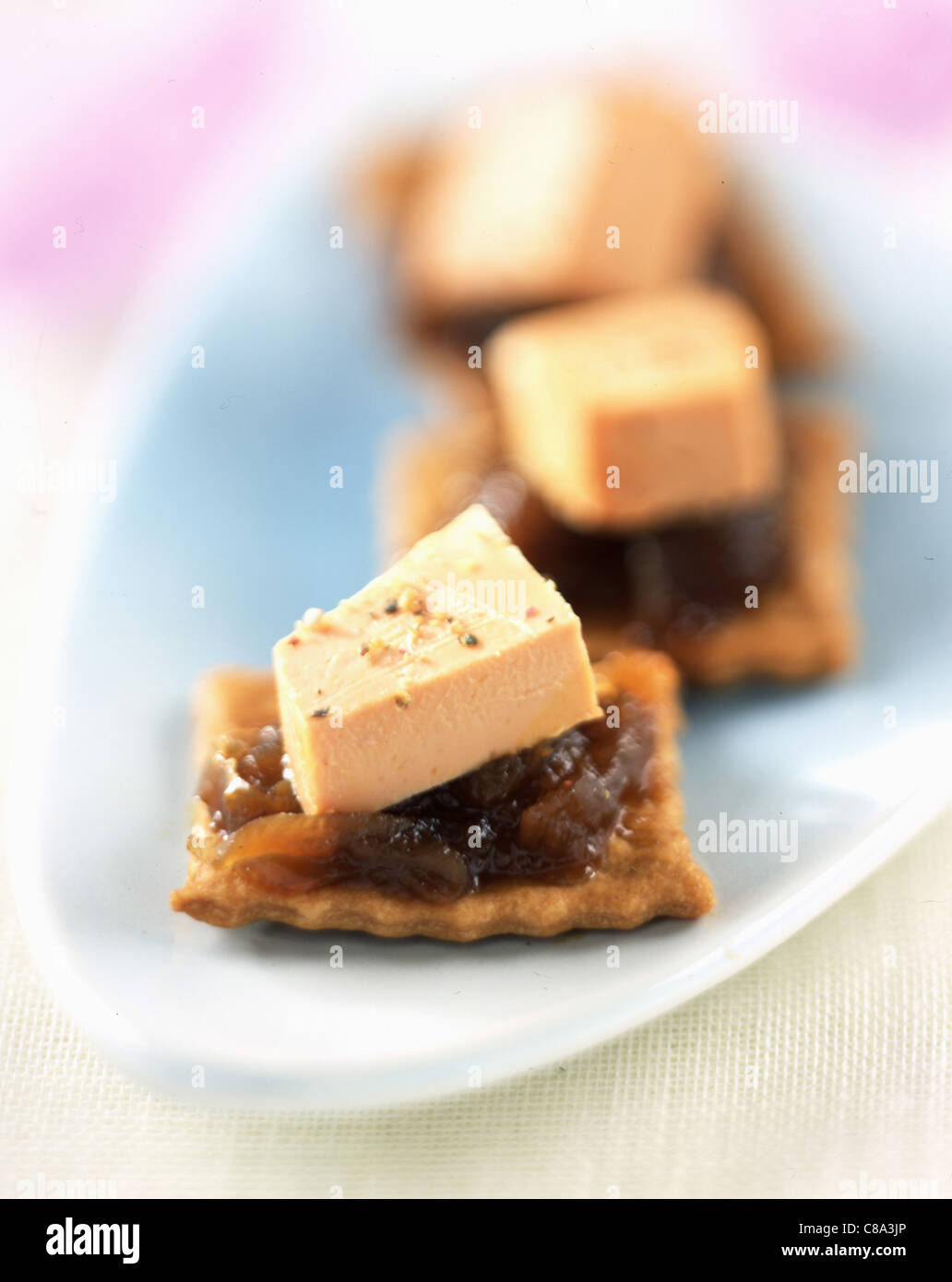 Mini foie gras tarts with onion jam Stock Photo Alamy