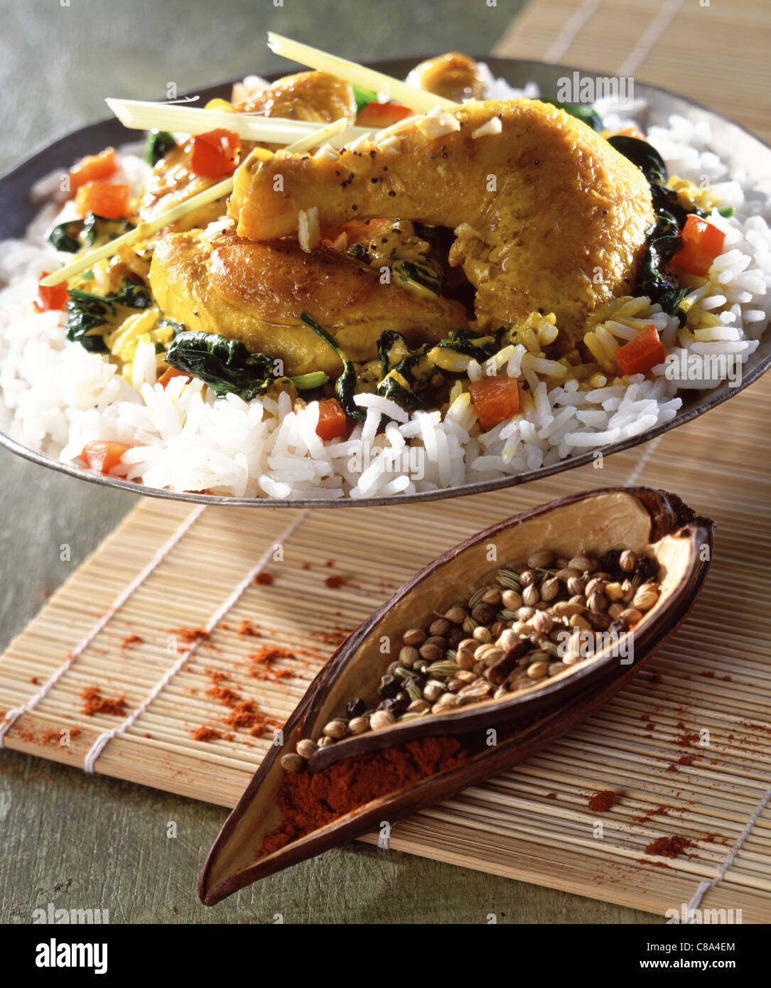 Spiced chicken and spinach curry Stock Photo Alamy