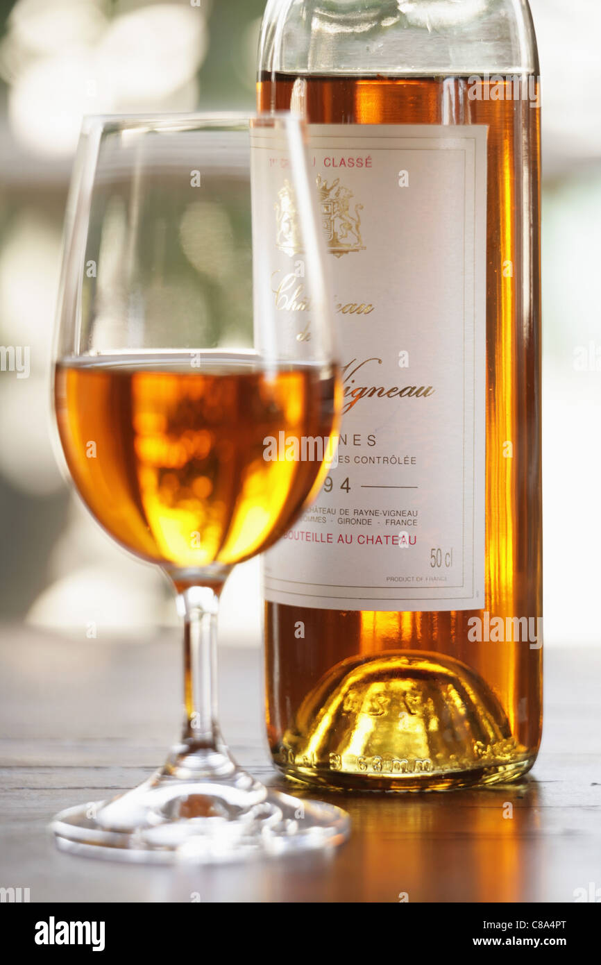 Bottle and glass of Sauternes Stock Photo - Alamy