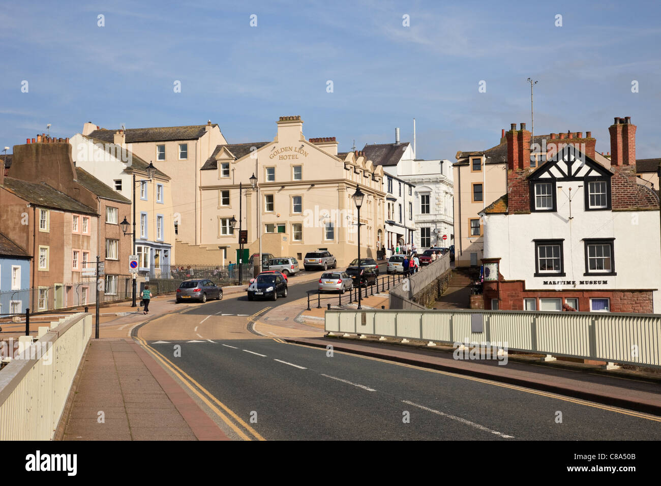 View along town main street from the bridge with Maritime Museum and Golden Lion Hotel. Maryport, Cumbria, England, UK, Britain. Stock Photo