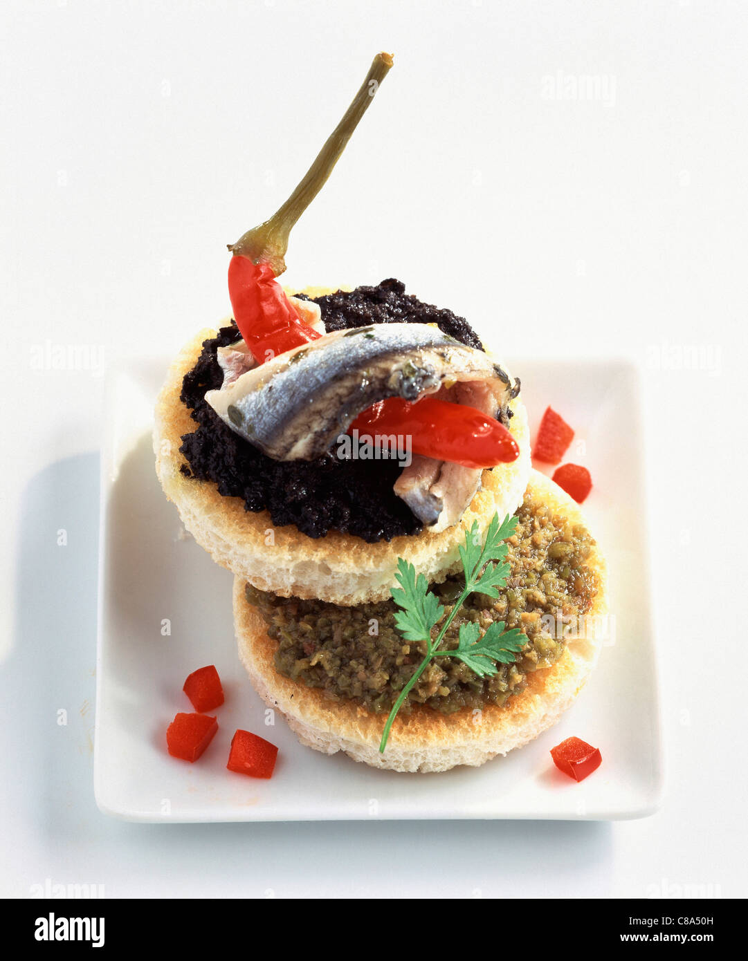 Anchovy and pepper tapas Stock Photo - Alamy
