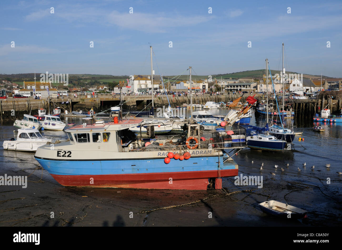 West Bay Dorset England UK a seaside resort on the Jurassic Coast The old harbour at low tide Stock Photo