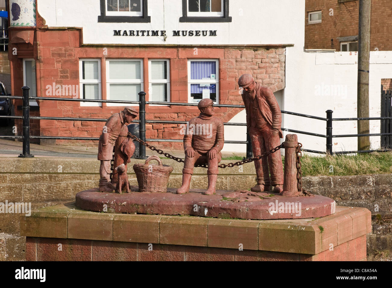 Colin Telfer's A Fishy Tale sculpture outside the Maritime Museum. Maryport, Cumbria, England, UK, Britain Stock Photo