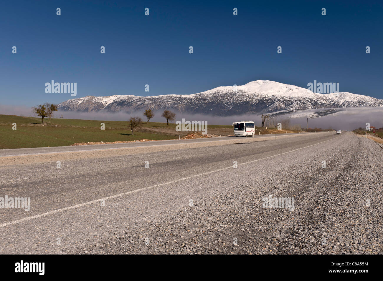 Winter on the D87 highway, approaching the city of Denizli. Stock Photo