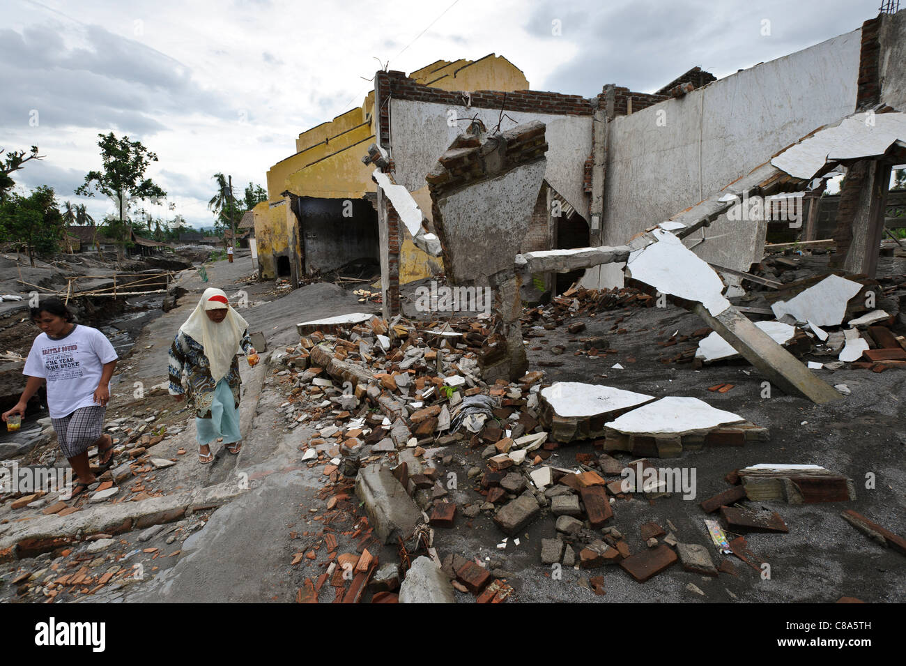 Houses badly damaged by a lahar mud flow in March 2011, Sirahan, Magelang, Yogyakarta, Java, Indonesia. Stock Photo