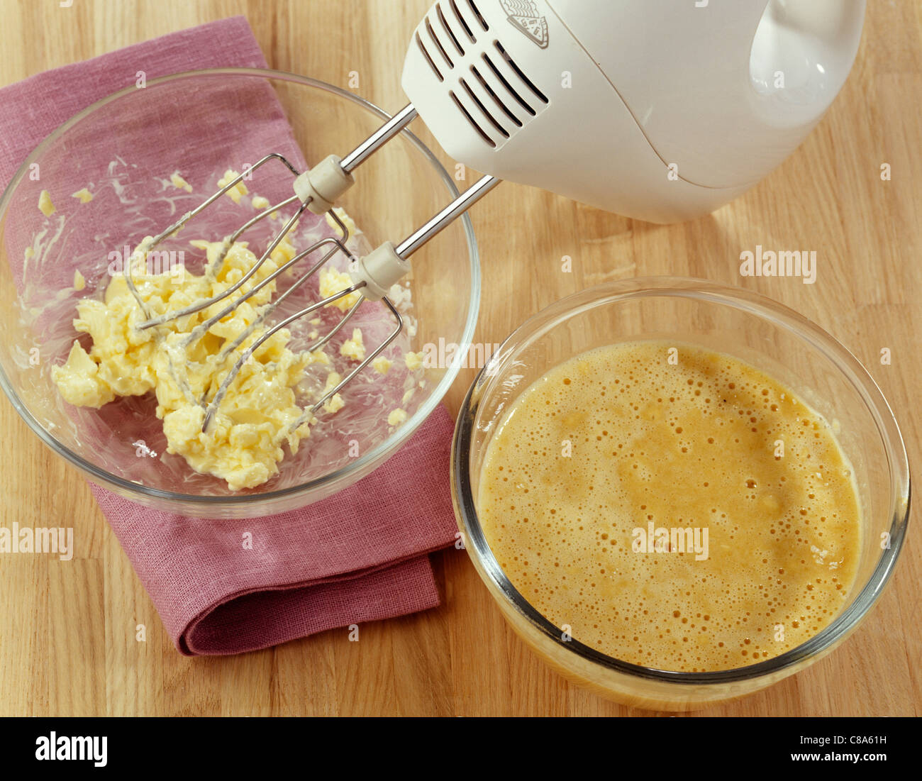 Softening the butter with an electric whisk Stock Photo Alamy
