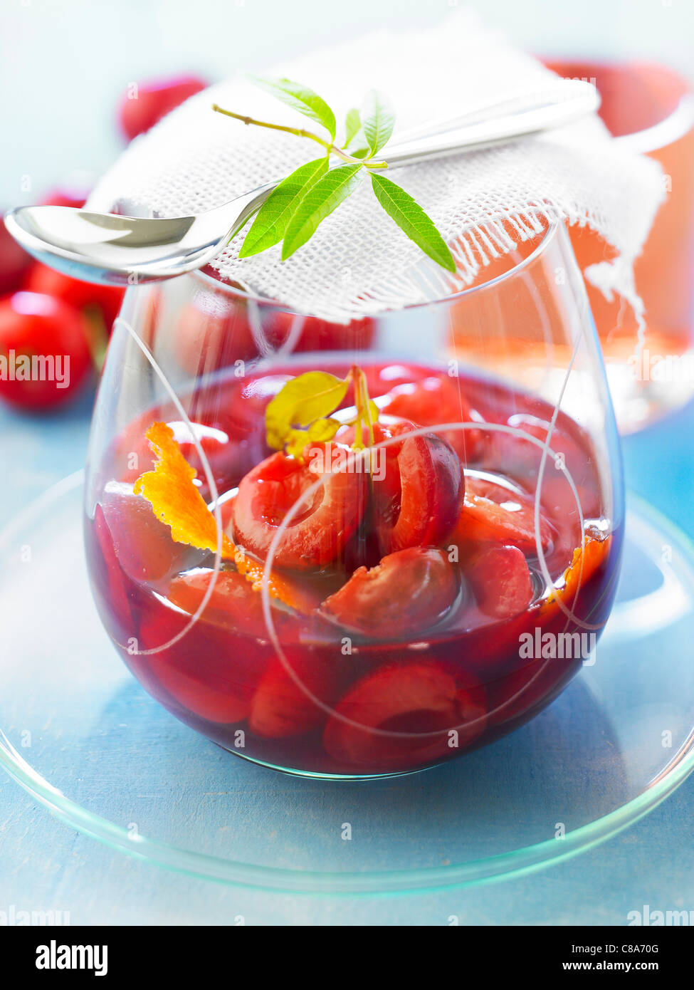 Cherries in red wine Stock Photo Alamy