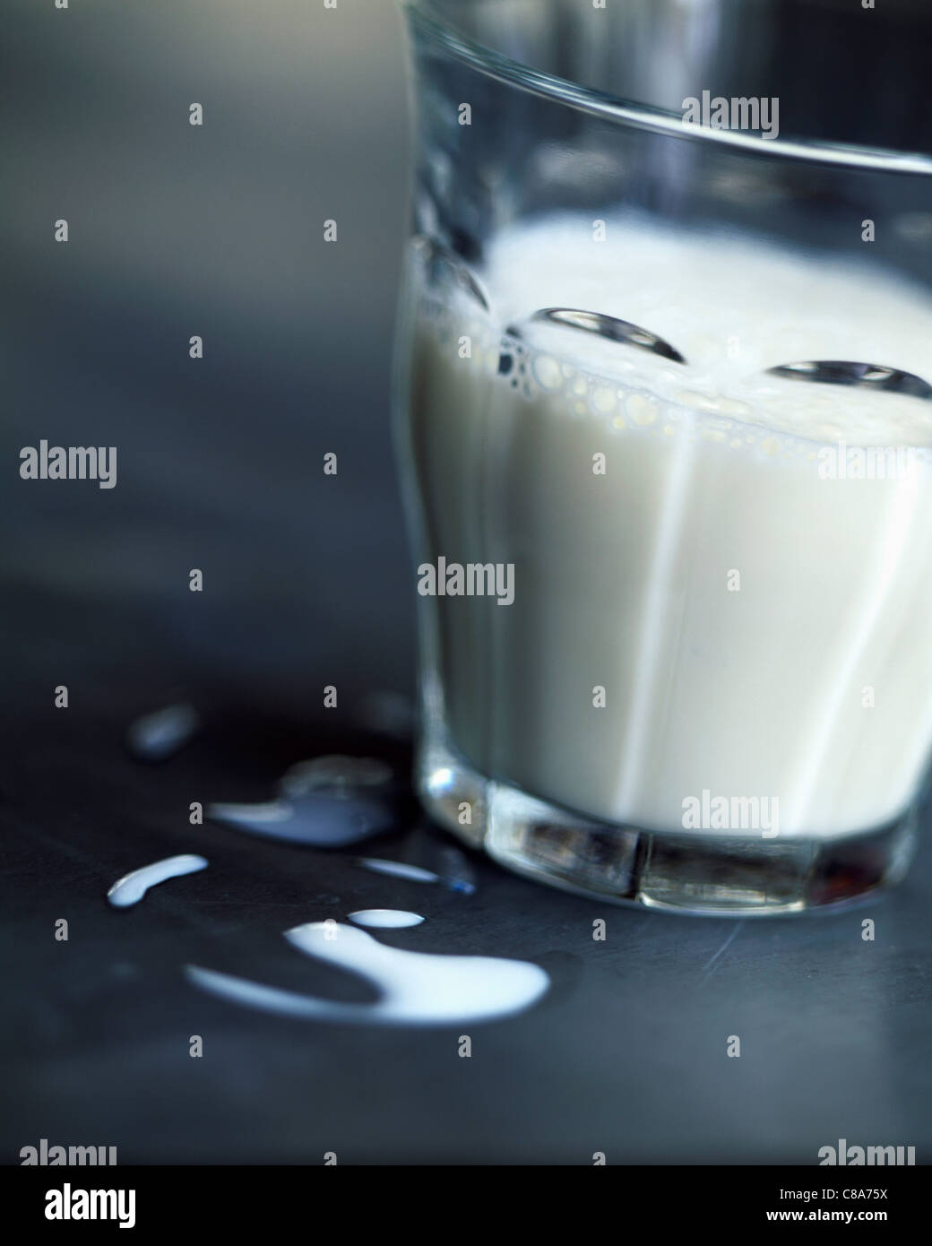 Glass of milk with stain Stock Photo Alamy