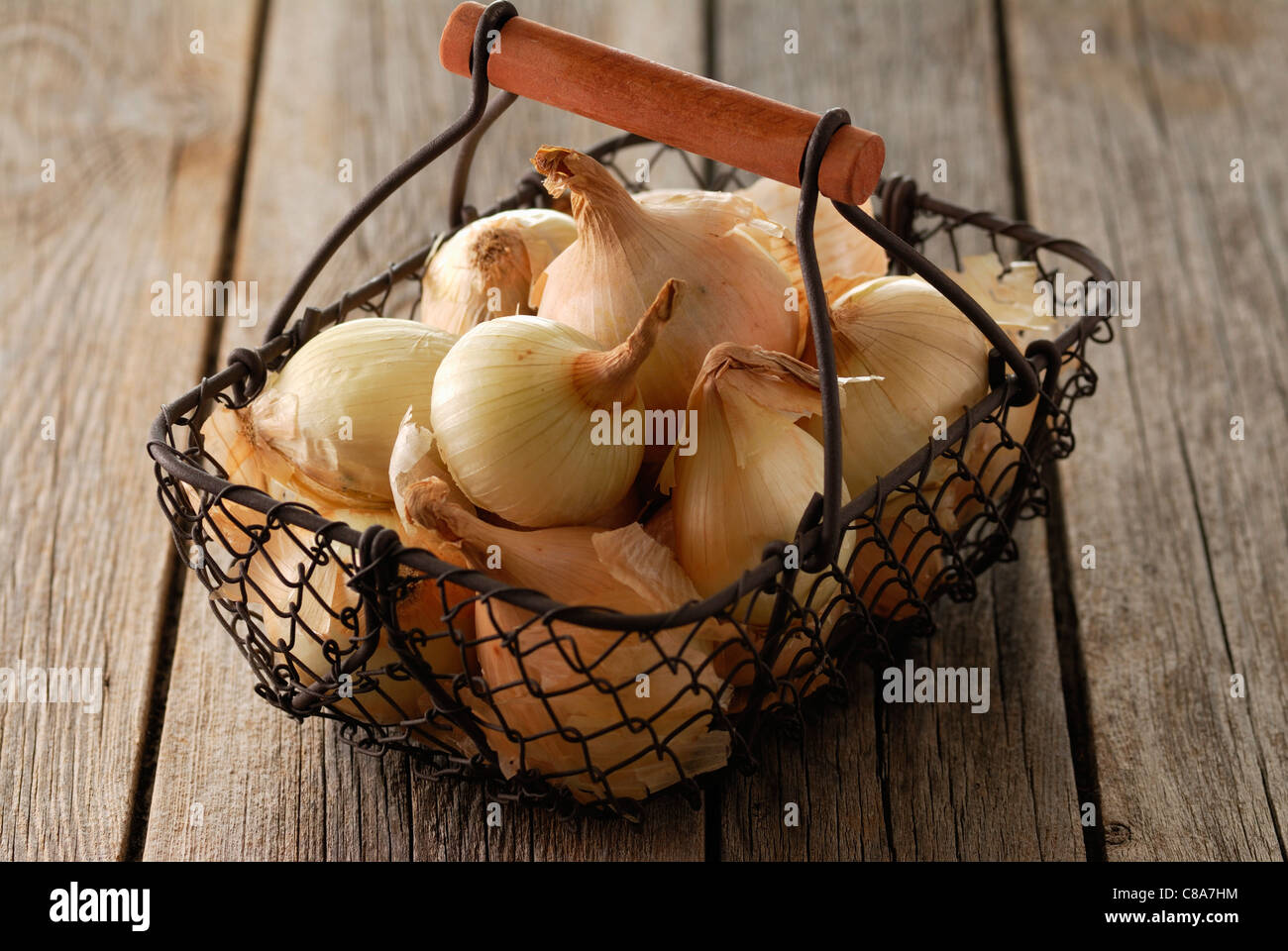 Basket of onions Stock Photo Alamy
