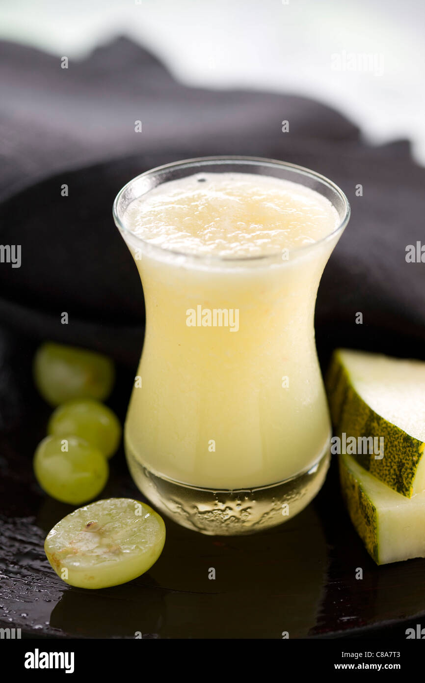 Melon and grape smoothie Stock Photo Alamy