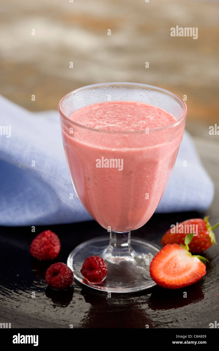Strawberry and raspberry milkshake Stock Photo - Alamy