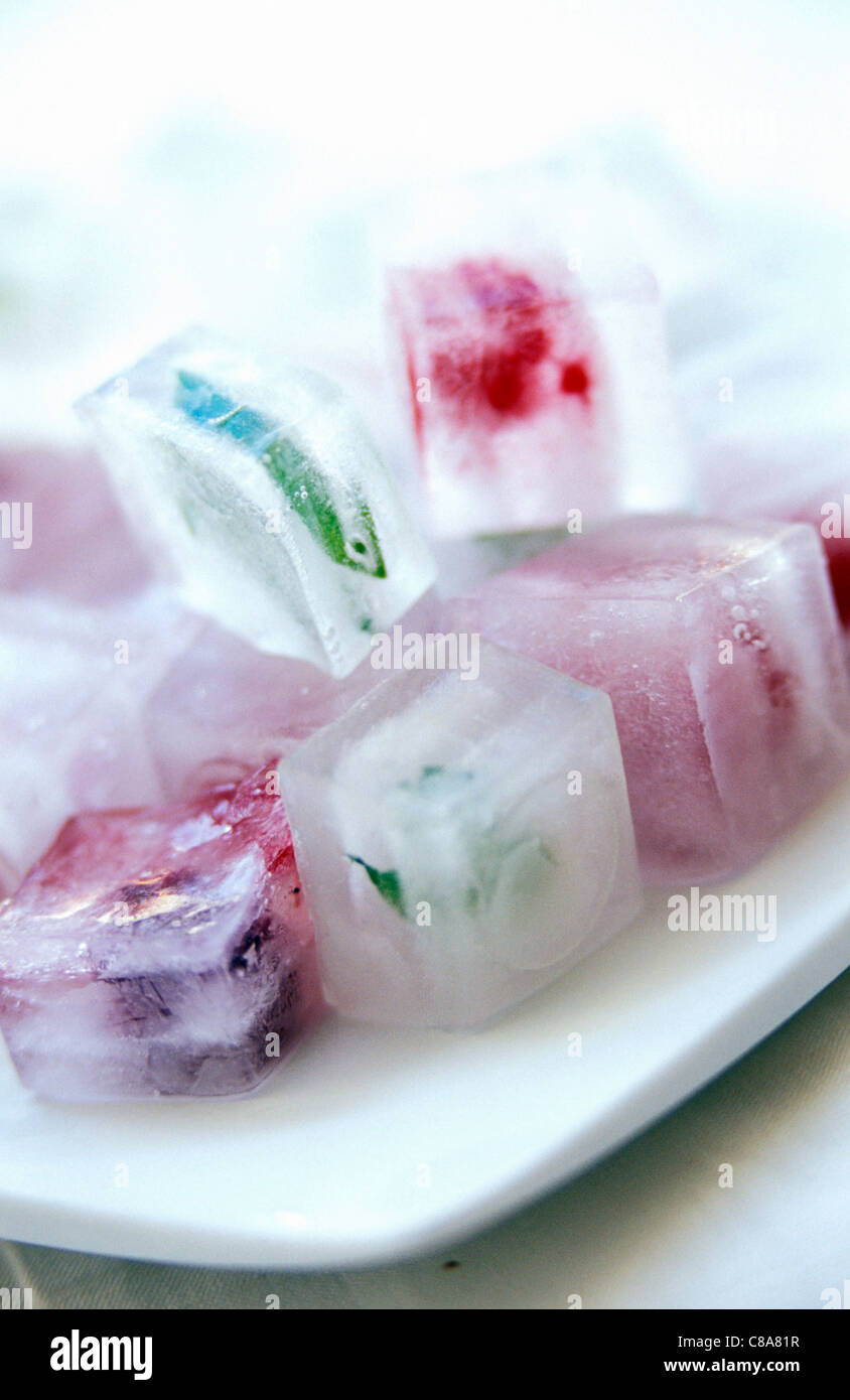 Summer fruit and mint in icecubes Stock Photo