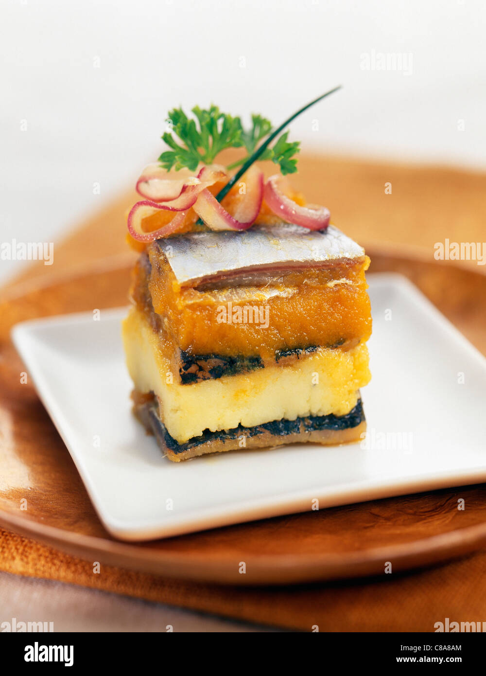 Herring savoury cake with stewed apricots Stock Photo Alamy