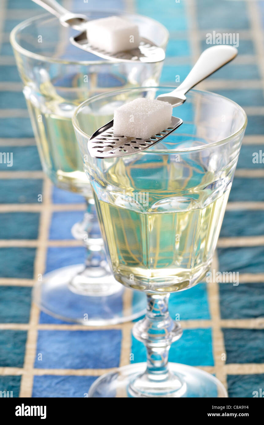 Glasses of Absinthe,spoon and sugar lump Stock Photo
