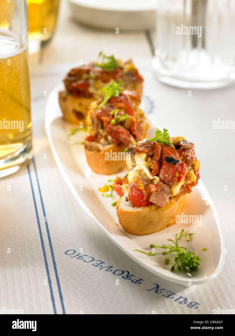 Scrambled egg and anchovy open sandwich Stock Photo