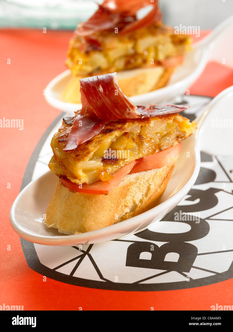 Spanish ham and potato omelette open sandwich Stock Photo