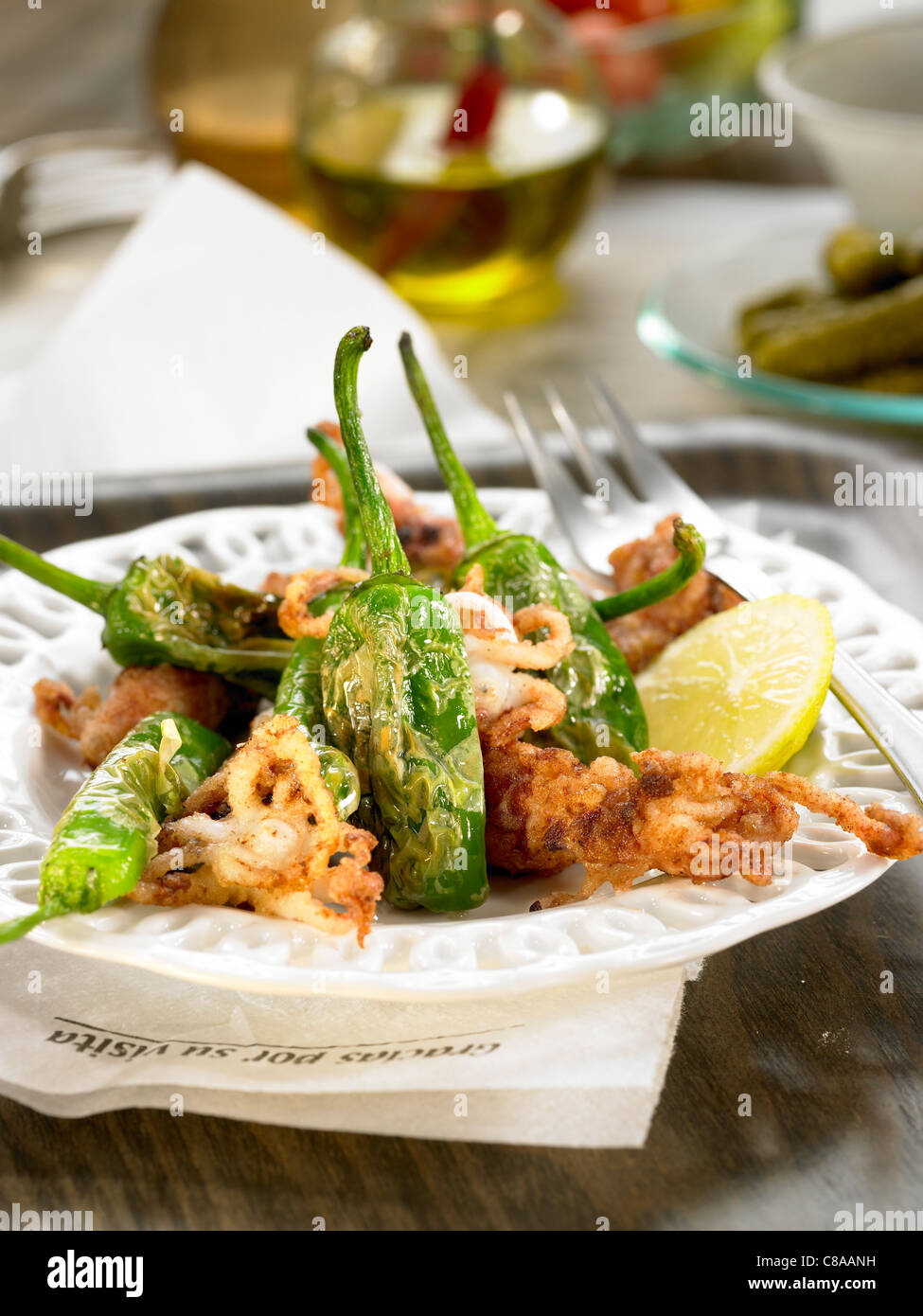 Fried green peppers and breaded calameries Stock Photo