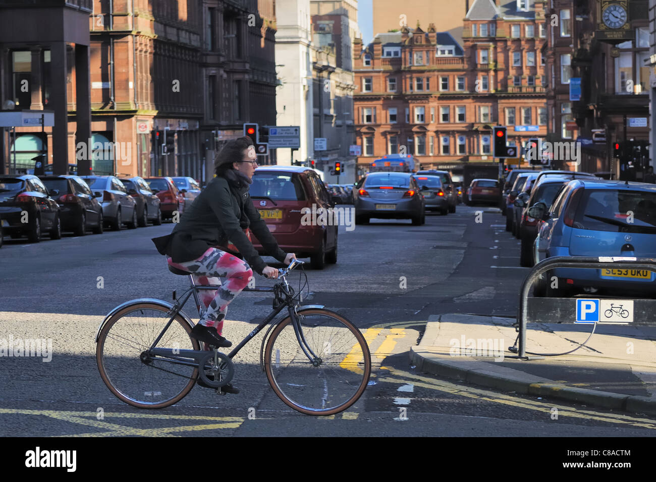 Girl on bike in Glasgow city centre Stock Photo Alamy
