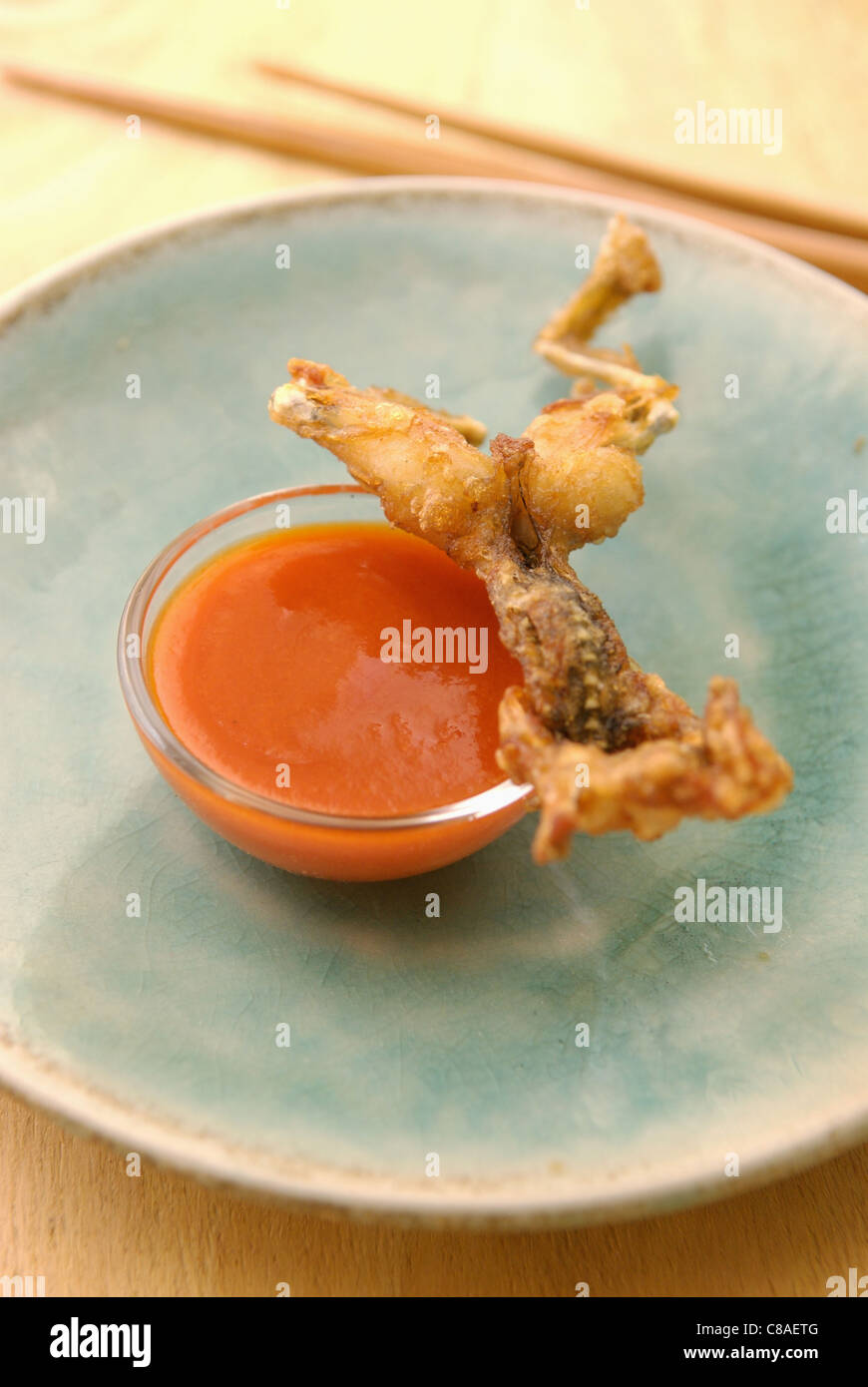 Deep-fried frog's leg Stock Photo