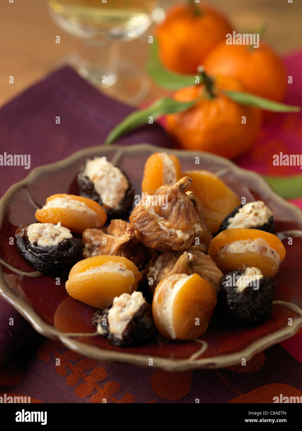 Dried fruit stuffed with goat's cheese and hazelnuts Stock Photo Alamy