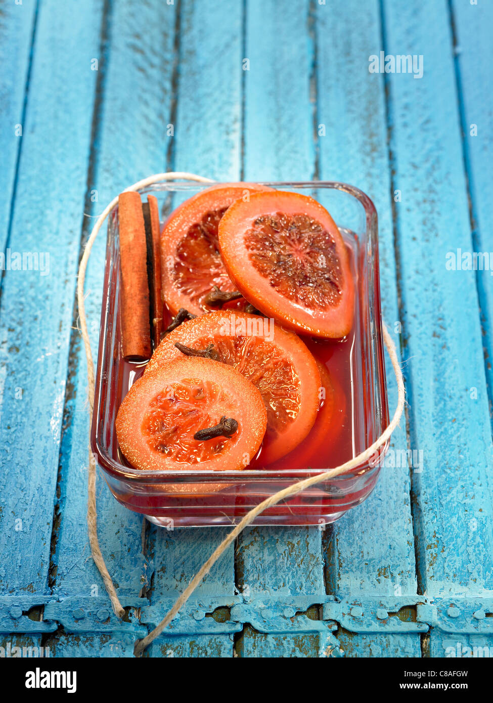 Sliced blood oranges with cloves and spices Stock Photo