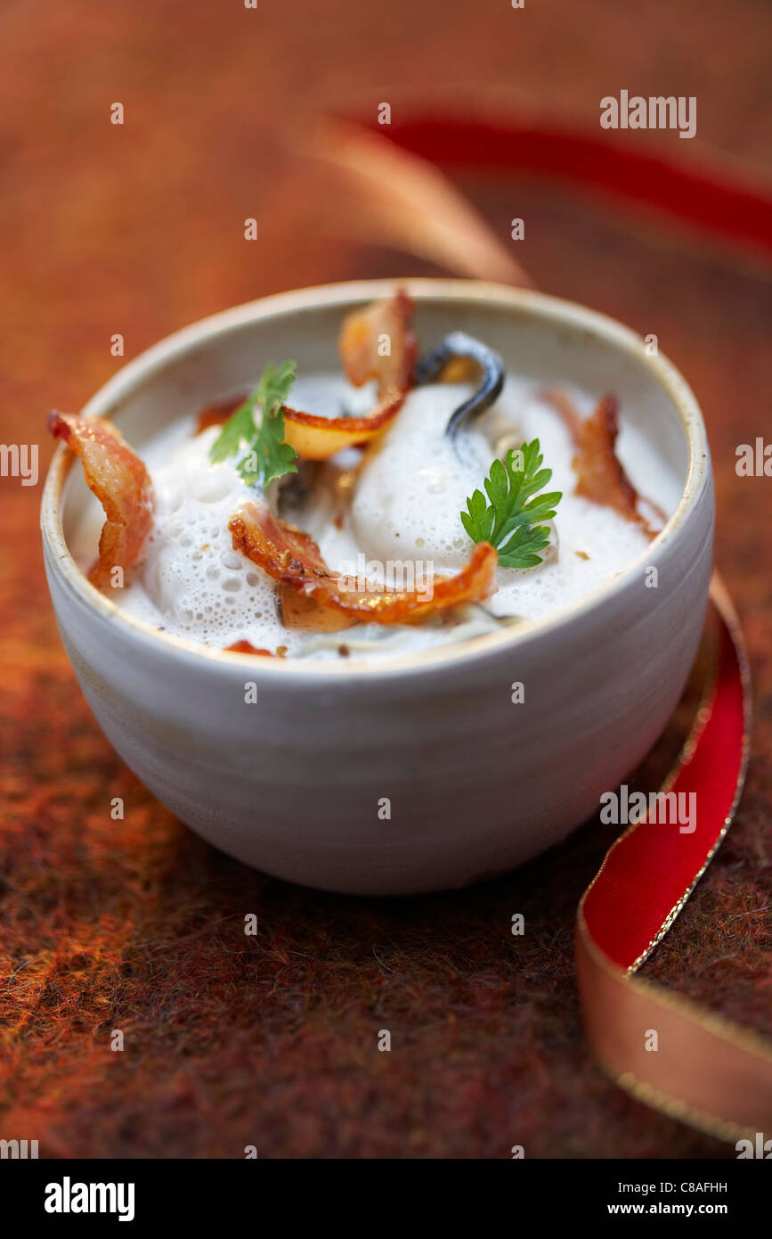 Mussel emulsion with fried bacon Stock Photo Alamy