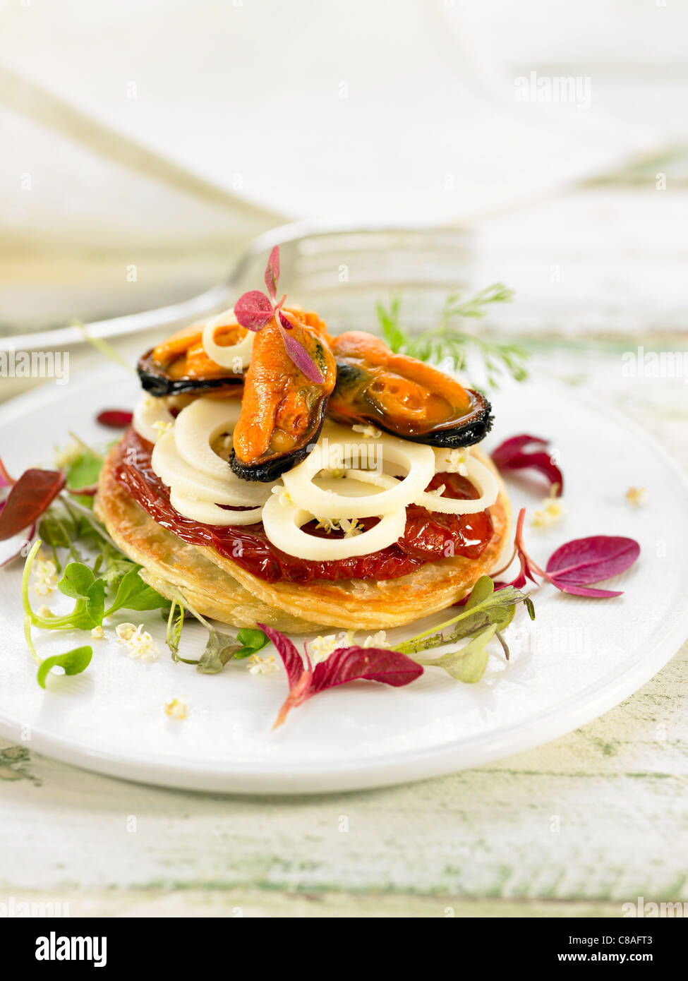 Palm heart and mussel flaky pastry tartlet Stock Photo