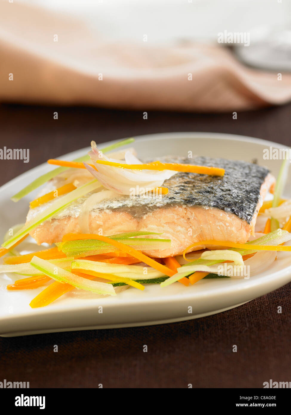 Ovenbaked salmon with vegetables Stock Photo Alamy