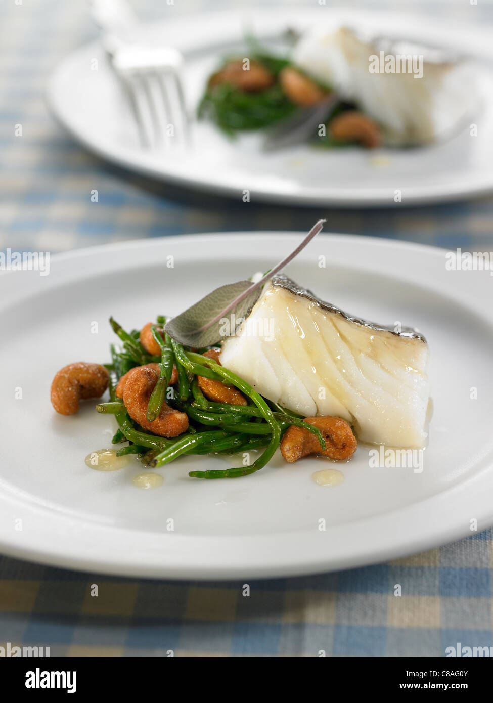 Saltcod with honey sauce Stock Photo Alamy