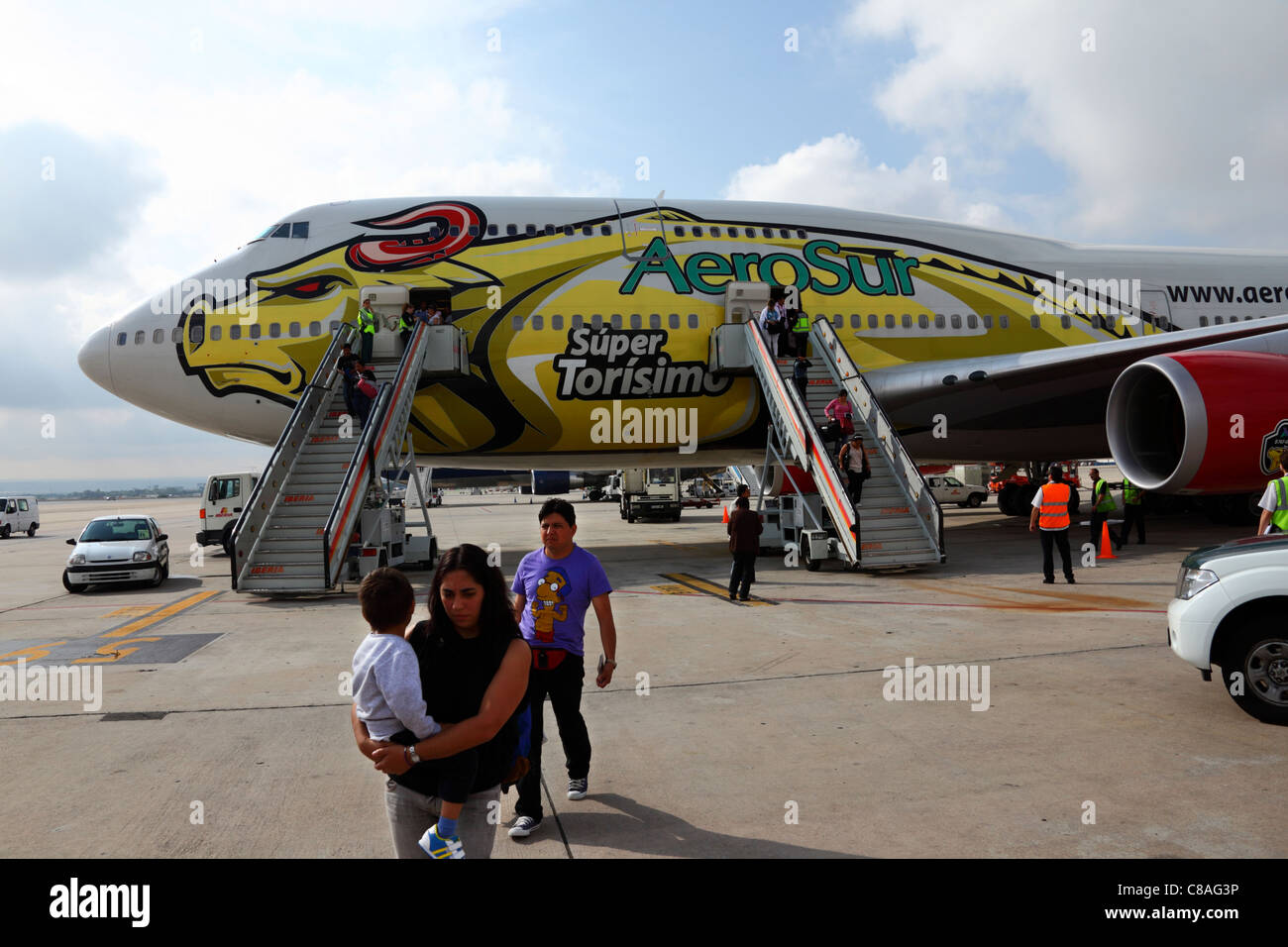 Passengers disembarking from Aerosur flight from Santa Cruz (Bolivia) at Madrid Barajas airport, Spain Stock Photo