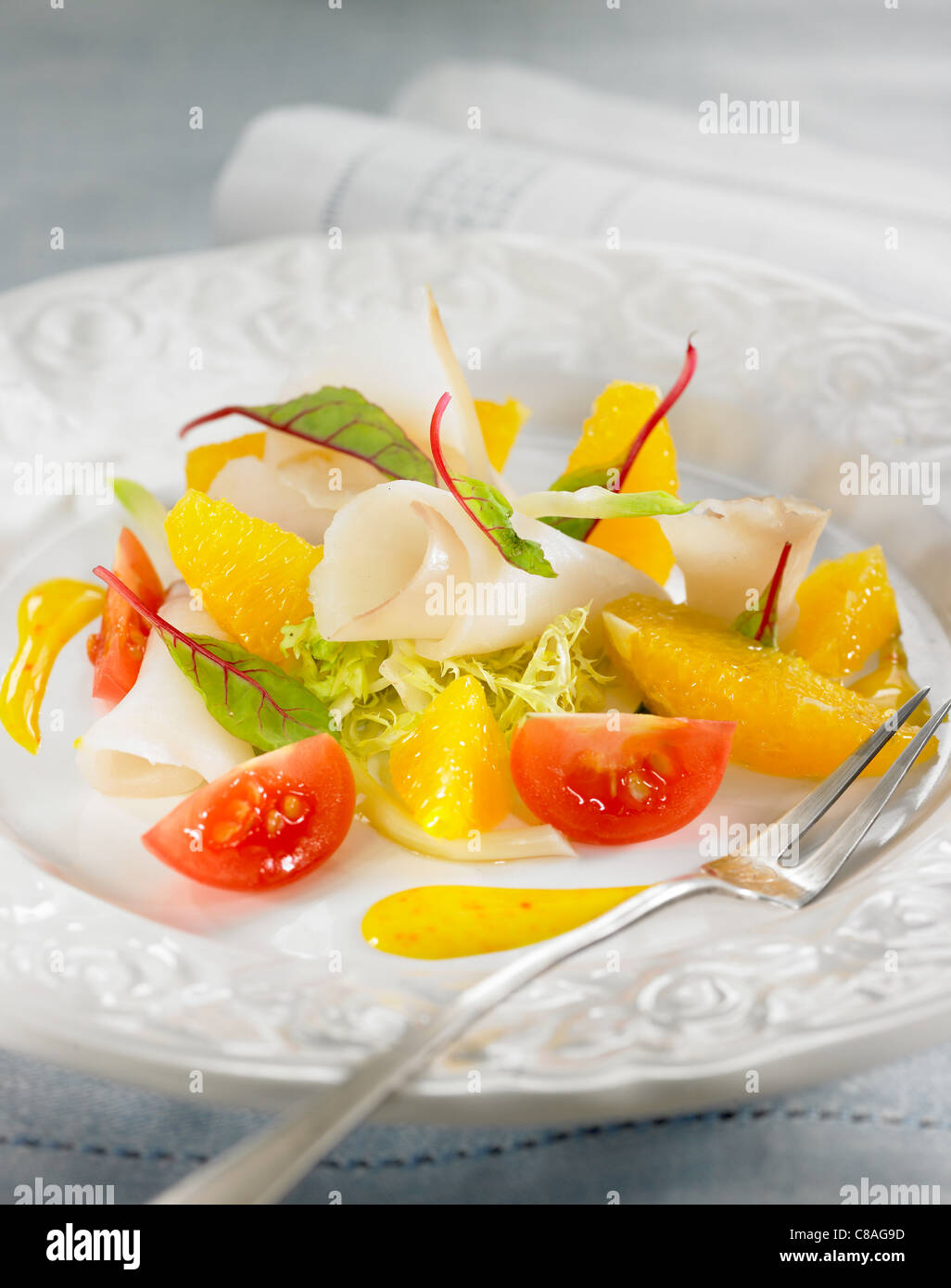 Smoked salt-cod with orange Stock Photo - Alamy