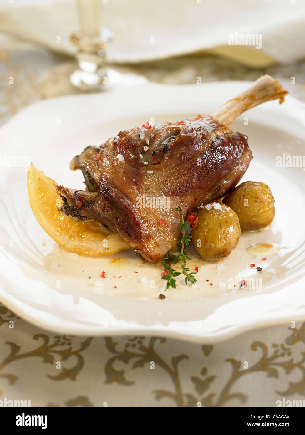 Oven-baked shoulder of lamb Stock Photo - Alamy