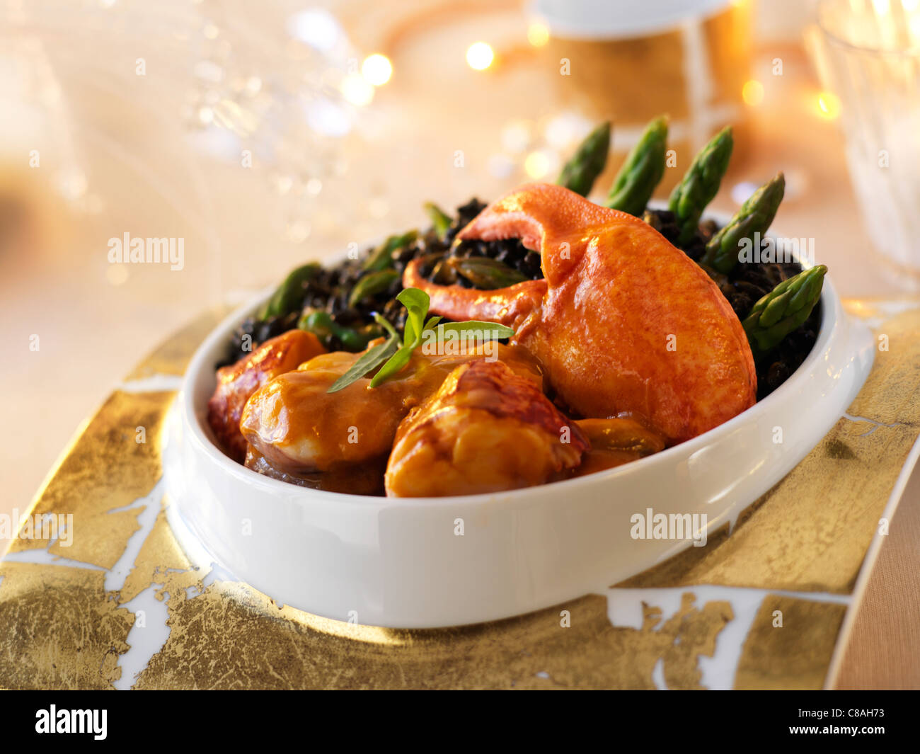 Lobster and monkfish duo with green asparagus Stock Photo