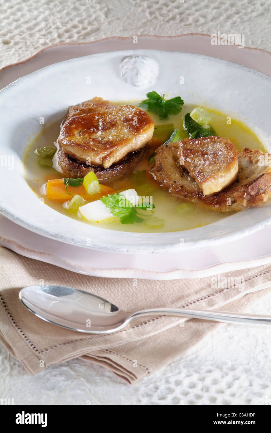 Pot Au Feu Broth With Pan Fried Foie Gras On Toast Stock Photo